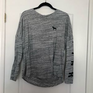 Grey long sleeve crew top with hot pink logo